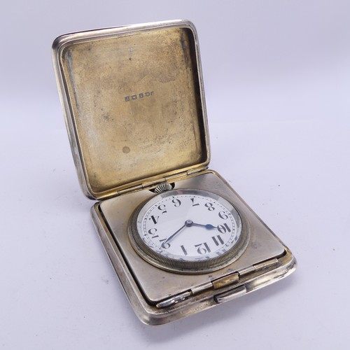 114 - A George V silver folding Travel Clock, by Henry Matthews, hallmarked Birmingham 1916, the unsigned ... 