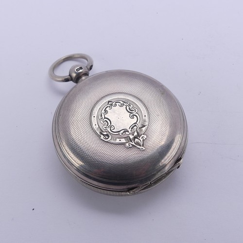 118 - A Victorian silver hunter cased Pocket Watch, by James McCabe, London, the white enamel dial marked ... 