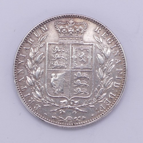 323 - A Victorian Half Crown, dated 1875, together with two others, 1883 and 1884, various grades as per i... 