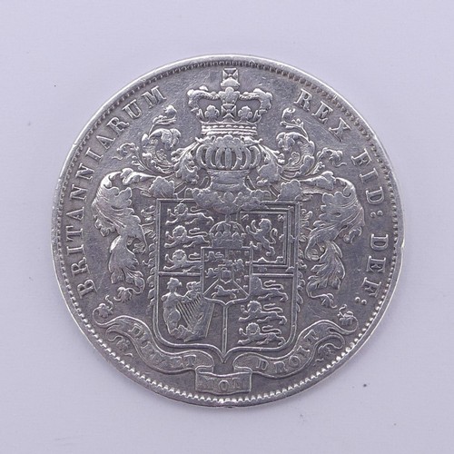 325 - A George IV Half Crown, dated 1825, better grade, together with two George V florins, dated 1916 and... 