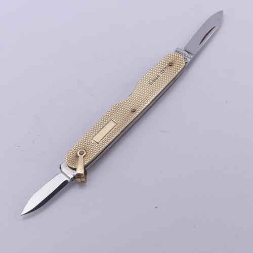 282 - A 9ct yellow gold Penknife, with engine turned decoration and two folding steel blades, vacant carto... 