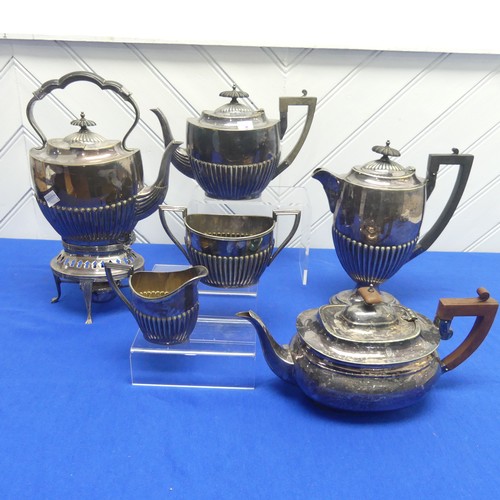 14 - A silver plated five piece Tea Set, by Walker & Hall, of oval form with demi-fluted decoration, ... 