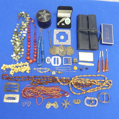 272 - A quantity of Costume Jewellery, including a Launer & Co., leather jewellery wrap, vintage white... 