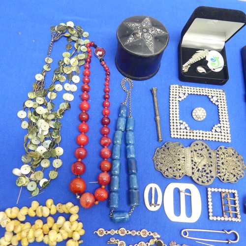 272 - A quantity of Costume Jewellery, including a Launer & Co., leather jewellery wrap, vintage white... 