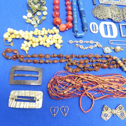 272 - A quantity of Costume Jewellery, including a Launer & Co., leather jewellery wrap, vintage white... 