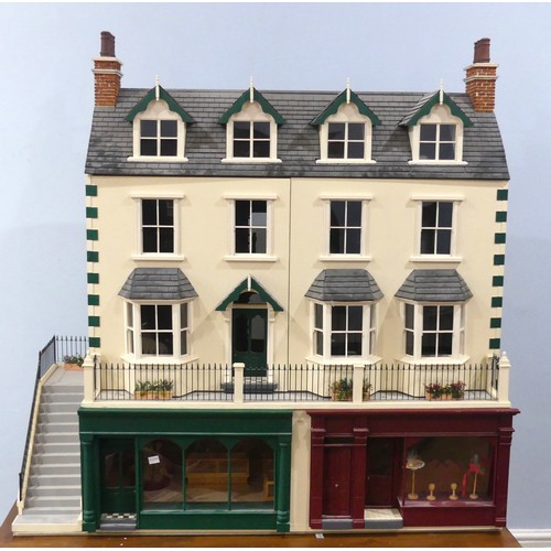 327 - A very large 20th century scratch built hand painted Dolls House, consisting of four floors, ground ... 