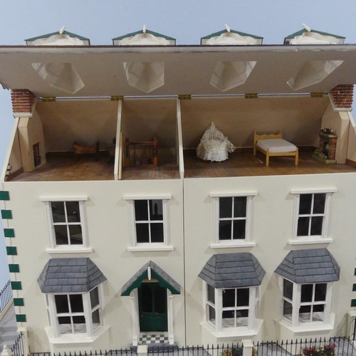 327 - A very large 20th century scratch built hand painted Dolls House, consisting of four floors, ground ... 