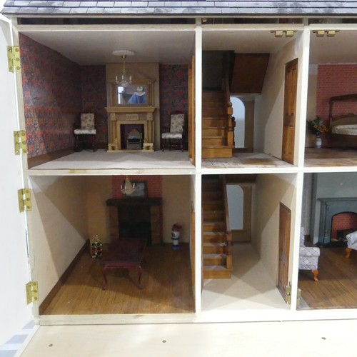 327 - A very large 20th century scratch built hand painted Dolls House, consisting of four floors, ground ... 