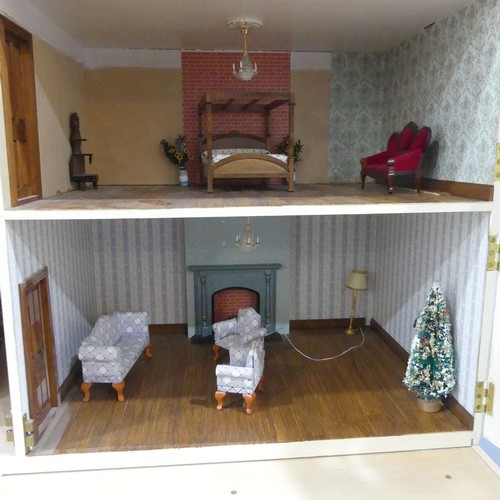 327 - A very large 20th century scratch built hand painted Dolls House, consisting of four floors, ground ... 