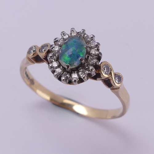 265A - An opal doublet and diamond cluster Ring, mounted in 9ct yellow gold, Size T, together with a 9ct ye... 