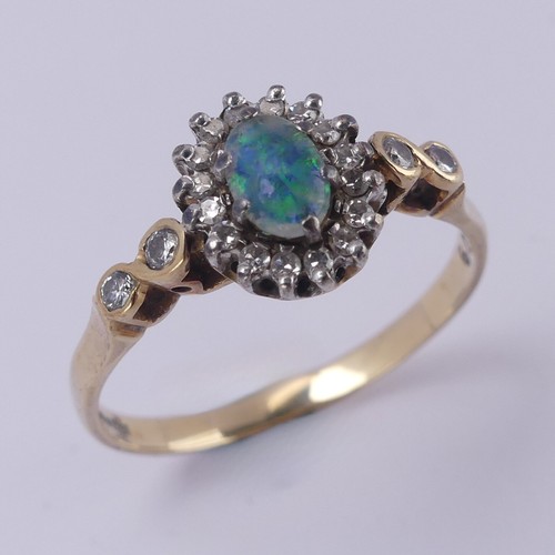 265A - An opal doublet and diamond cluster Ring, mounted in 9ct yellow gold, Size T, together with a 9ct ye... 