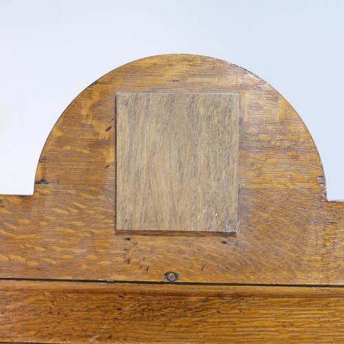 527 - A rare Shapland and Petter of Barnstaple oak Arts and Crafts Hall Stand, the arched top inset with h... 