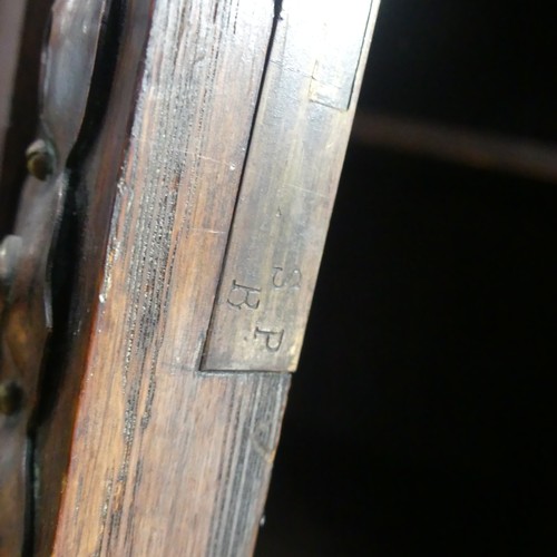 513 - A Shapland and Petter of Barnstaple Arts and Crafts oak Sideboard, the raised top with pierced flora... 