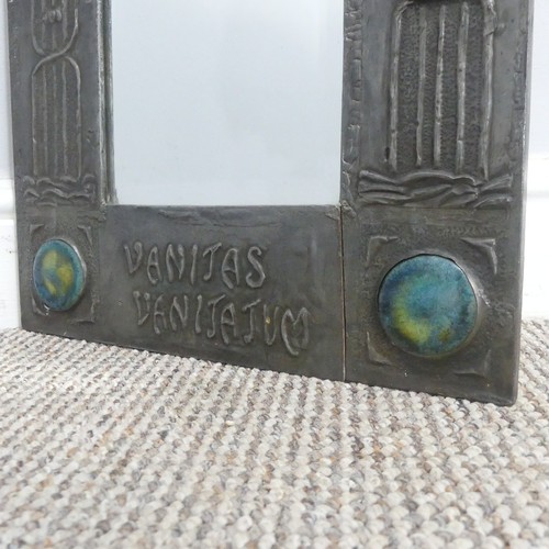 521 - An Arts and Crafts pewter Mirror, the frame embossed with stylised flowers and birds, inscribed 'Van... 