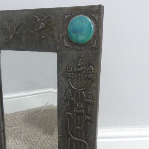 521 - An Arts and Crafts pewter Mirror, the frame embossed with stylised flowers and birds, inscribed 'Van... 