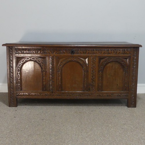 668 - A 19th century carved oak Coffer, raised on square supports, W 124 cm x H 60 cm x D 48.5 cm.... 