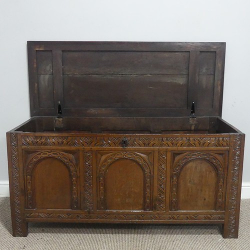 668 - A 19th century carved oak Coffer, raised on square supports, W 124 cm x H 60 cm x D 48.5 cm.... 