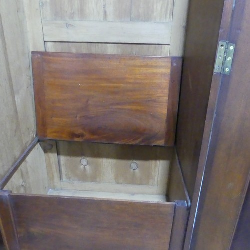 561 - A Victorian burr walnut compactum Wardrobe, the moulded cornice over two doors concealing interior w... 