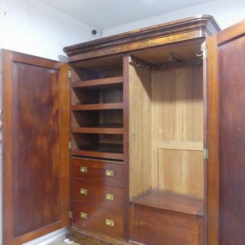 561 - A Victorian burr walnut compactum Wardrobe, the moulded cornice over two doors concealing interior w... 