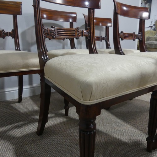 635 - A set of six 19th century Regency style mahogany bar-back dining Chairs, each with a carved centre-r... 