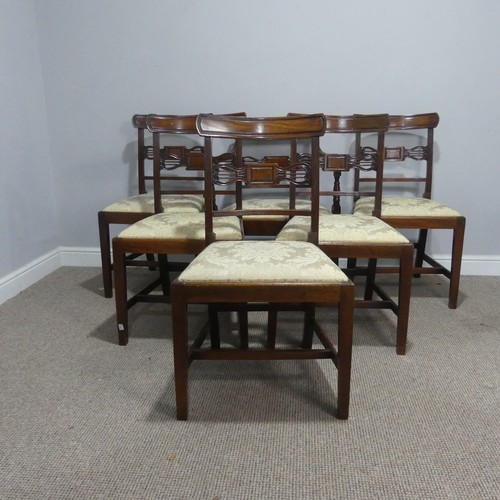 611 - A set of six Georgian mahogany dining Chairs, with one carver, each with a carved centre-rail and up... 