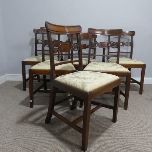 611 - A set of six Georgian mahogany dining Chairs, with one carver, each with a carved centre-rail and up... 