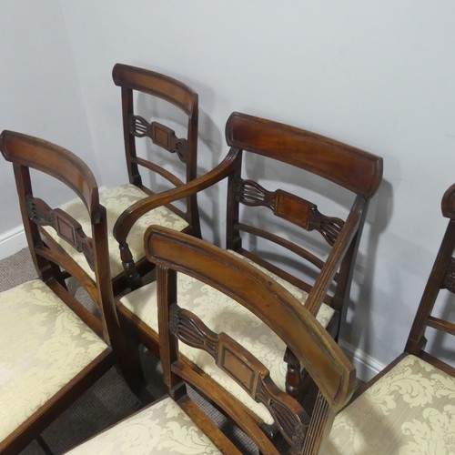 611 - A set of six Georgian mahogany dining Chairs, with one carver, each with a carved centre-rail and up... 