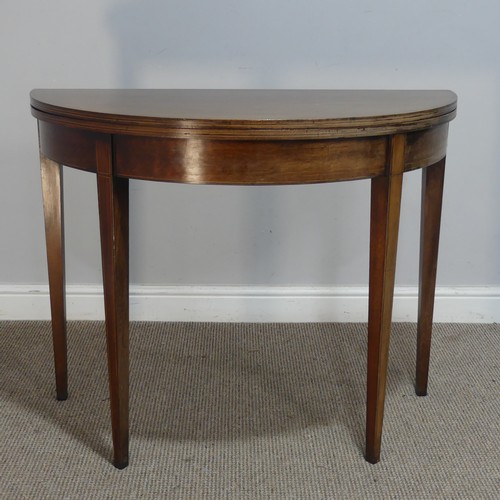 605 - A 19th century mahogany demi-lune tea Table, raised on tapering supports, W 92.5 cm x H 72.5 cm x D ... 