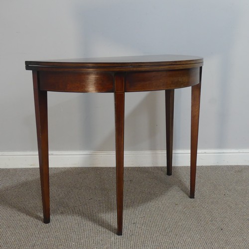 605 - A 19th century mahogany demi-lune tea Table, raised on tapering supports, W 92.5 cm x H 72.5 cm x D ... 