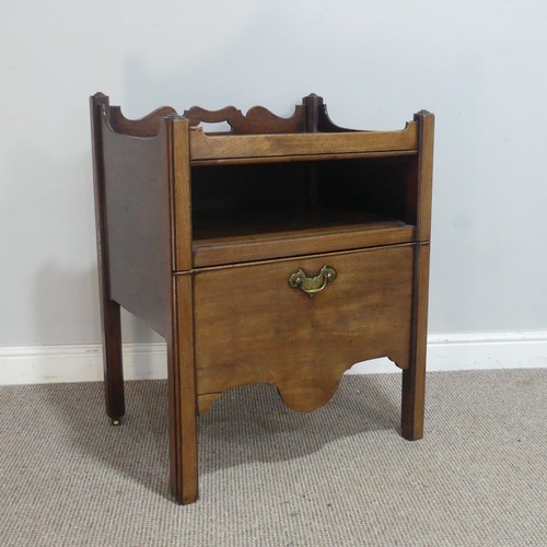 676 - A 19th century mahogany tray-top Commode, the shaped gallery pierced with handgrip, above open shelf... 