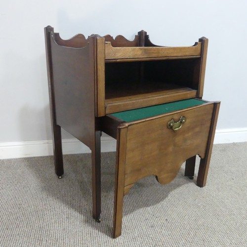 676 - A 19th century mahogany tray-top Commode, the shaped gallery pierced with handgrip, above open shelf... 