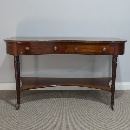 580 - An early 19th century mahogany kidney-shaped dressing/side Table, inlaid with ebony stringing, the k... 