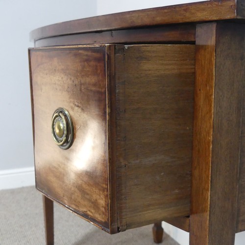 582 - A Regency mahogany bow-front side Table/Desk, of small proportions, the shaped top above three drawe... 