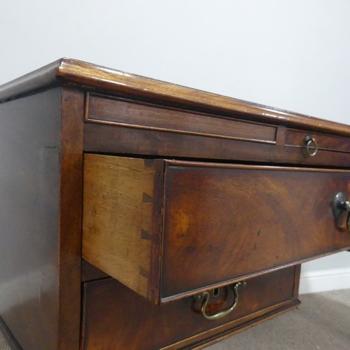 602 - A George III mahogany Desk, the top inset with green gilt-tooled leather writing surface, above brus... 