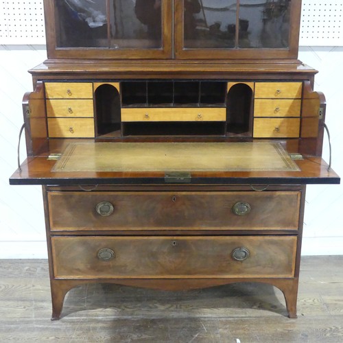 572 - A George III mahogany secretaire Bookcase, the upper section with moulded cornice over arched astrag... 