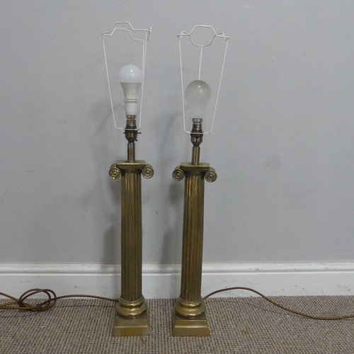 624 - A pair of brass Corinthian column table Tamps, on stepped bases, H 45 cm(2)