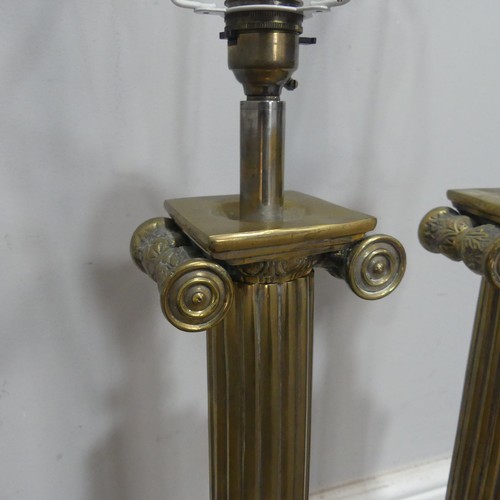 624 - A pair of brass Corinthian column table Tamps, on stepped bases, H 45 cm(2)