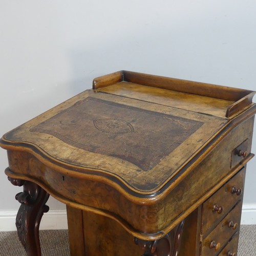 597 - A Victorian burr walnut Davenport, the top with three-quarter gallery and sloped serpentine fall fro... 