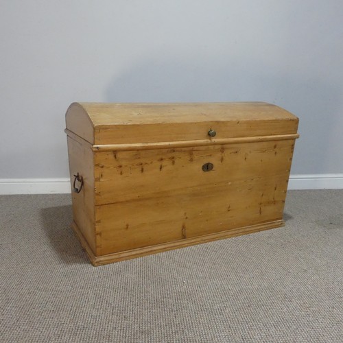 677 - A pine domed top Trunk, with carrying handles to either side, W 100 cm x H 65 cm x D 58 cm.... 