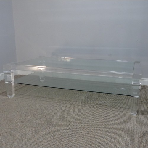 608 - An Italian Lucite and glass topped coffee Table, c.1970, by Fabian Art, Rome, with glass shelf under... 