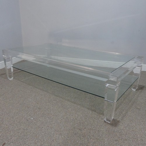 608 - An Italian Lucite and glass topped coffee Table, c.1970, by Fabian Art, Rome, with glass shelf under... 