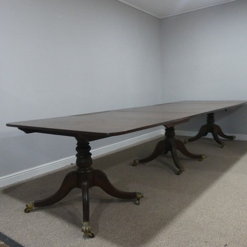 613 - A very large George III style mahogany triple pedestal dining Table, early 20th century, the extendi... 