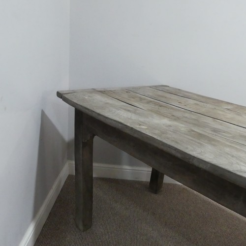 620 - A 19th century French elm weathered kitchen farmhouse Table, the four panel top with cleated ends, r... 