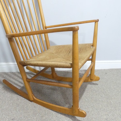 652 - Hans Wegner (Danish, 1914 - 2007) for FDB Mobler, a model No. J.16 beech rocking Chair, with a twine... 