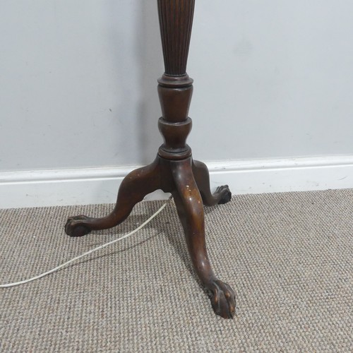 657 - A 19th century carved standard Lamp, carved and reeded column, raised on tripod base and claw ball f... 