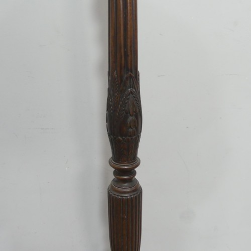 657 - A 19th century carved standard Lamp, carved and reeded column, raised on tripod base and claw ball f... 