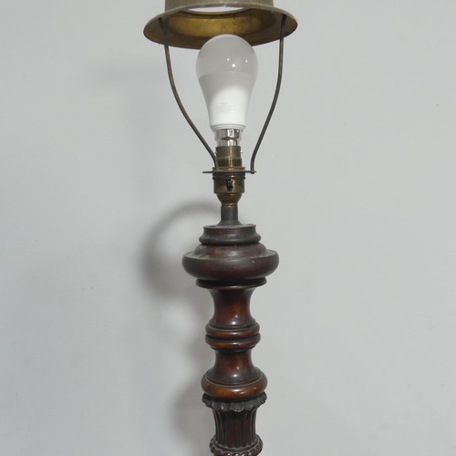 657 - A 19th century carved standard Lamp, carved and reeded column, raised on tripod base and claw ball f... 