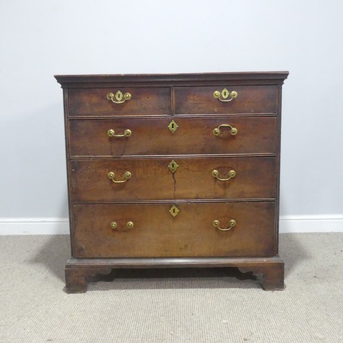 654 - A 19th century oak panelled Chest of drawers, with two short over three long drawers, raised on brac... 