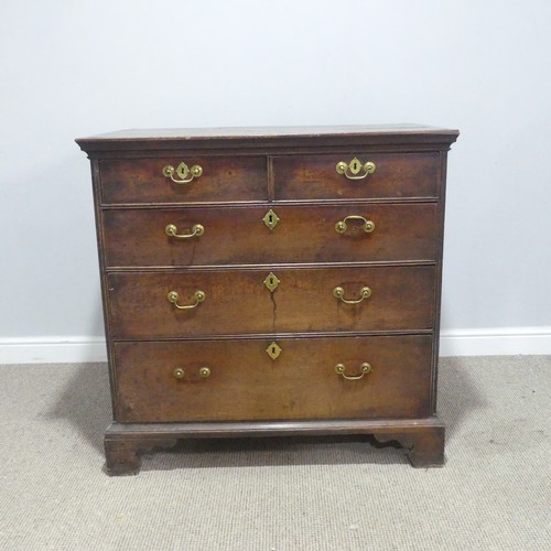 654 - A 19th century oak panelled Chest of drawers, with two short over three long drawers, raised on brac... 