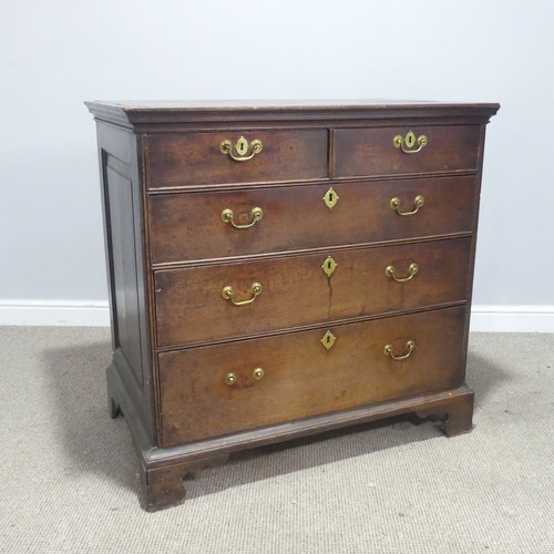 654 - A 19th century oak panelled Chest of drawers, with two short over three long drawers, raised on brac... 